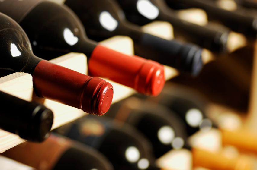 Wine bottles stored in a shelf, very shallof DoF